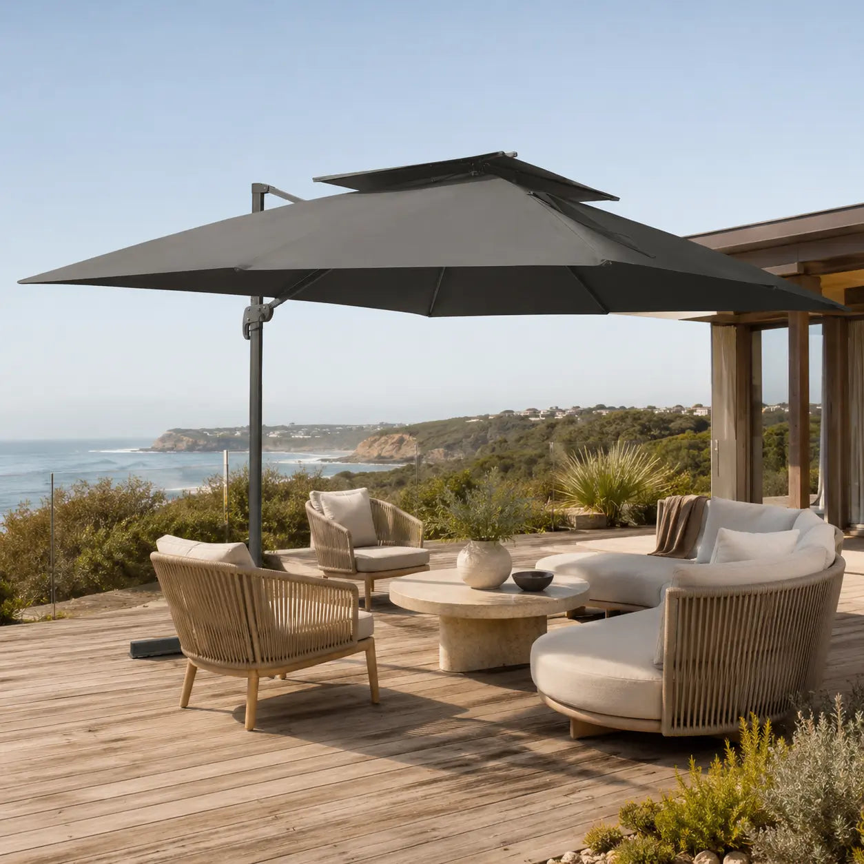 Anthracite cantilever umbrella on patio Image