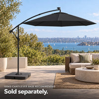 Round cantilever umbrella 3m black 100kg weighted base outdoor lounge rattan sofa coastal harbour view