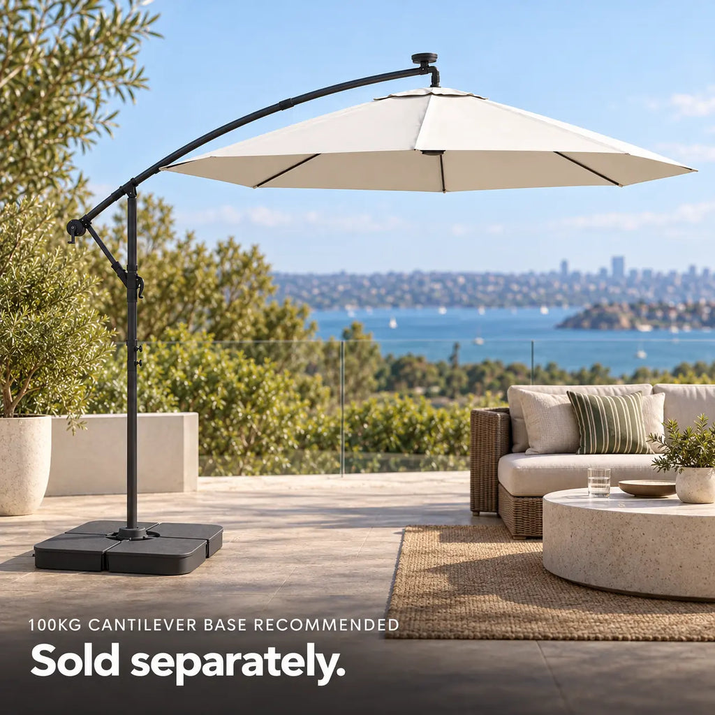Round cantilever umbrella 3m sand 100kg weighted base outdoor lounge rattan sofa coastal harbour view