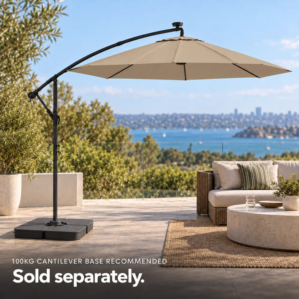 Round cantilever umbrella 3m taupe 100kg weighted base outdoor lounge rattan sofa coastal harbour view