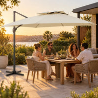 Cantilever umbrella 3x3 ivory outdoor dining group friends sunset sea view terrace