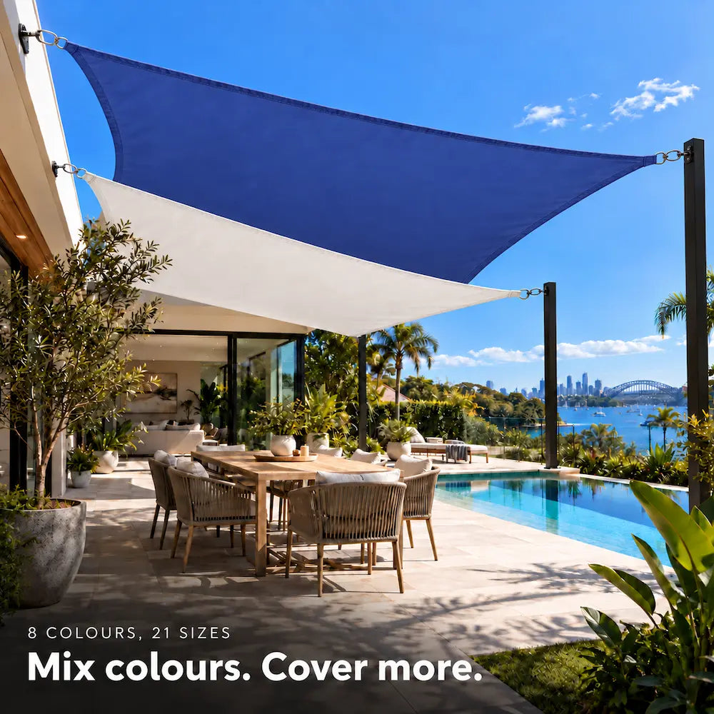 Shade sail in ocean blue and white, two rectangles layered beside a swimming pool with harbour view