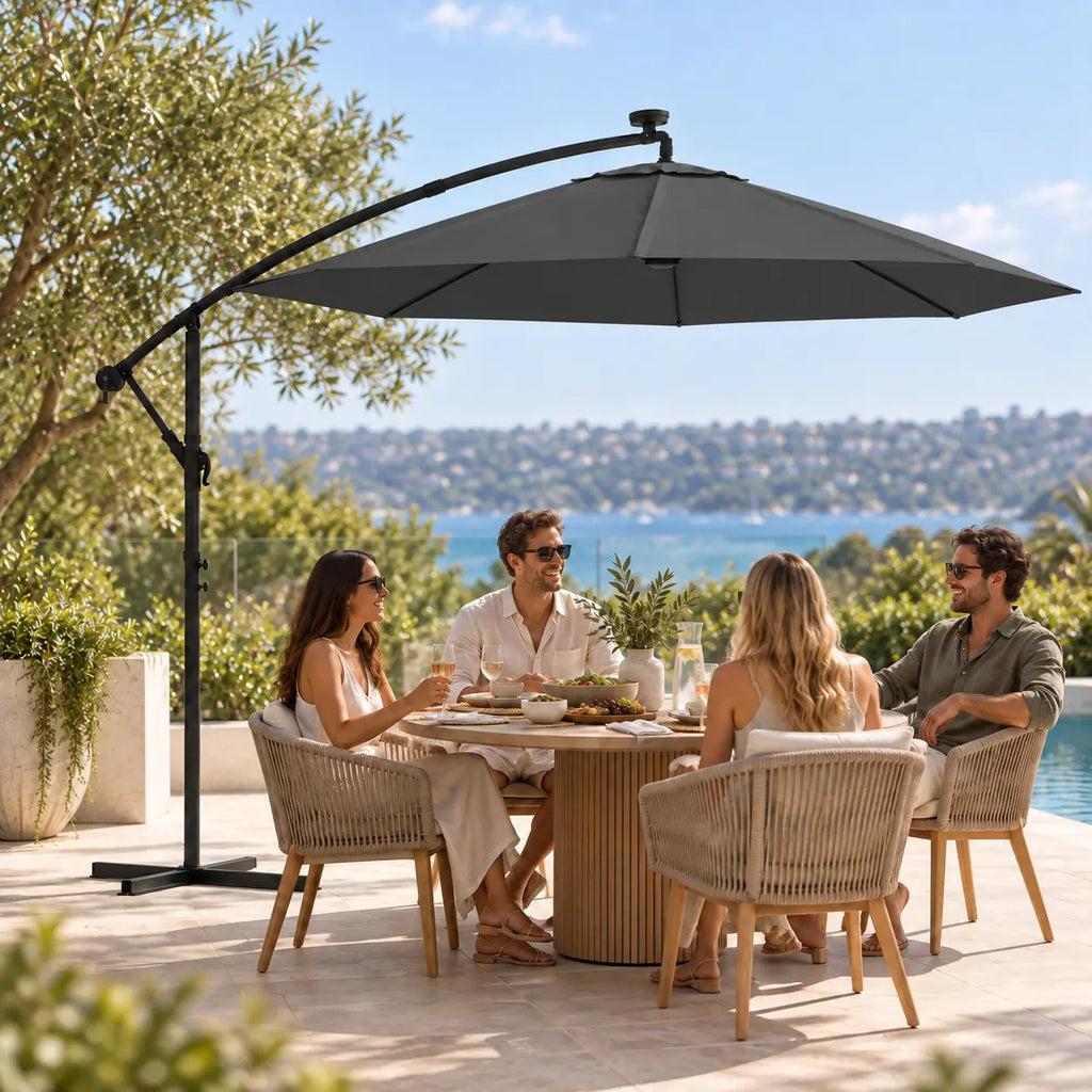 Round cantilever umbrella 3m anthracite friends outdoor dining round pedestal table poolside sea view daytime
