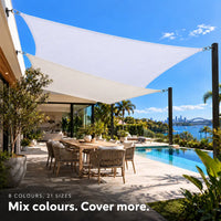 Shade sail pair in white, two rectangular sails over a pool deck with city and harbour views