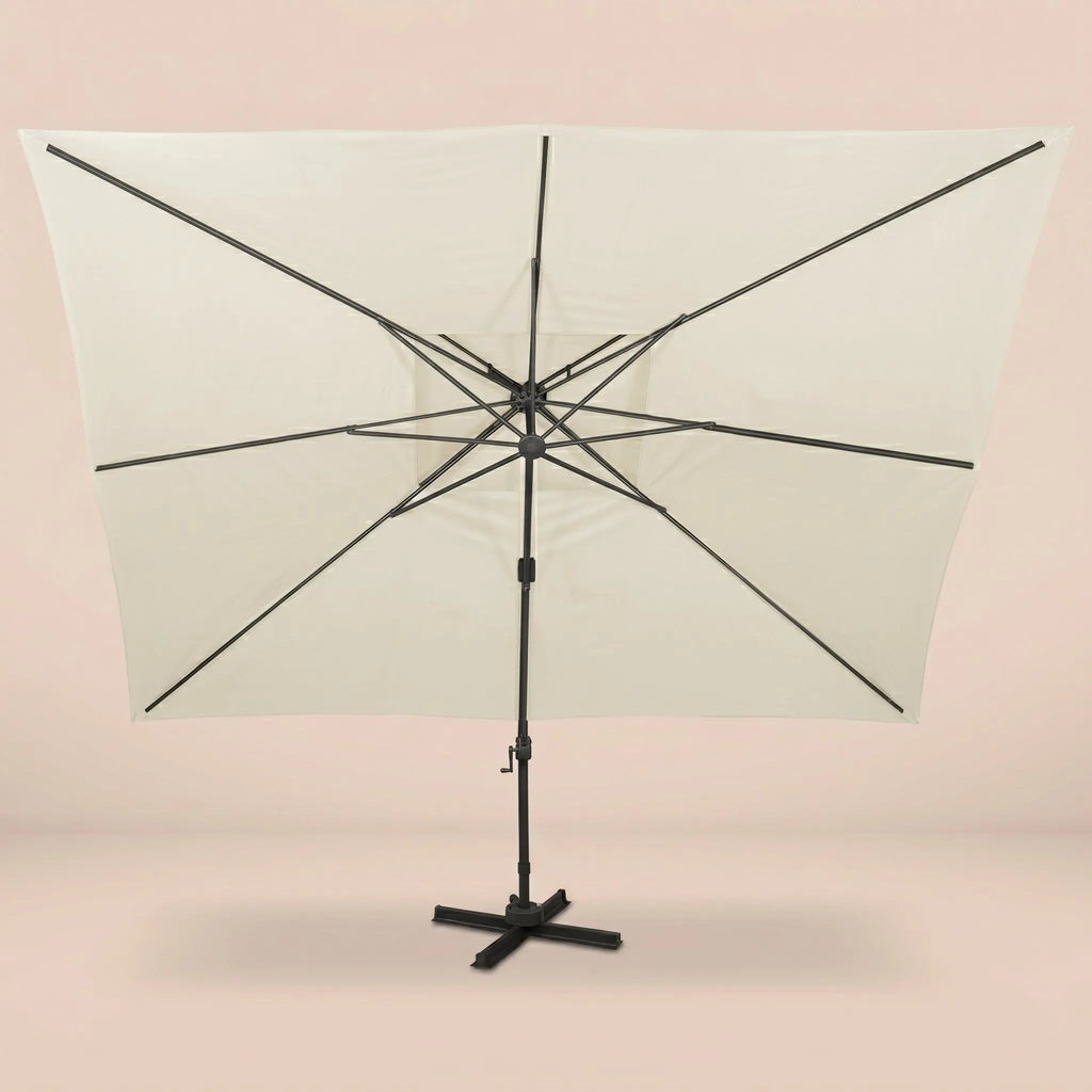 Rear view of the Sirocco XL 3x4m cantilever umbrella with eight-rib frame and vented double canopy in ivory