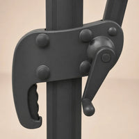 Close-up of the crank handle and locking mechanism on the Levant XL 3x4m cantilever umbrella in anthracite aluminium
