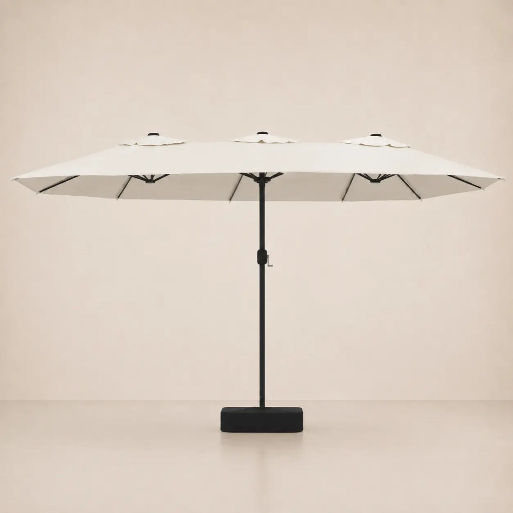 Sand white double canopy market umbrella with integrated LED lights, black aluminium pole and weighted square base