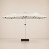 Sand white double canopy market umbrella with integrated LED lights, black aluminium pole and weighted square base