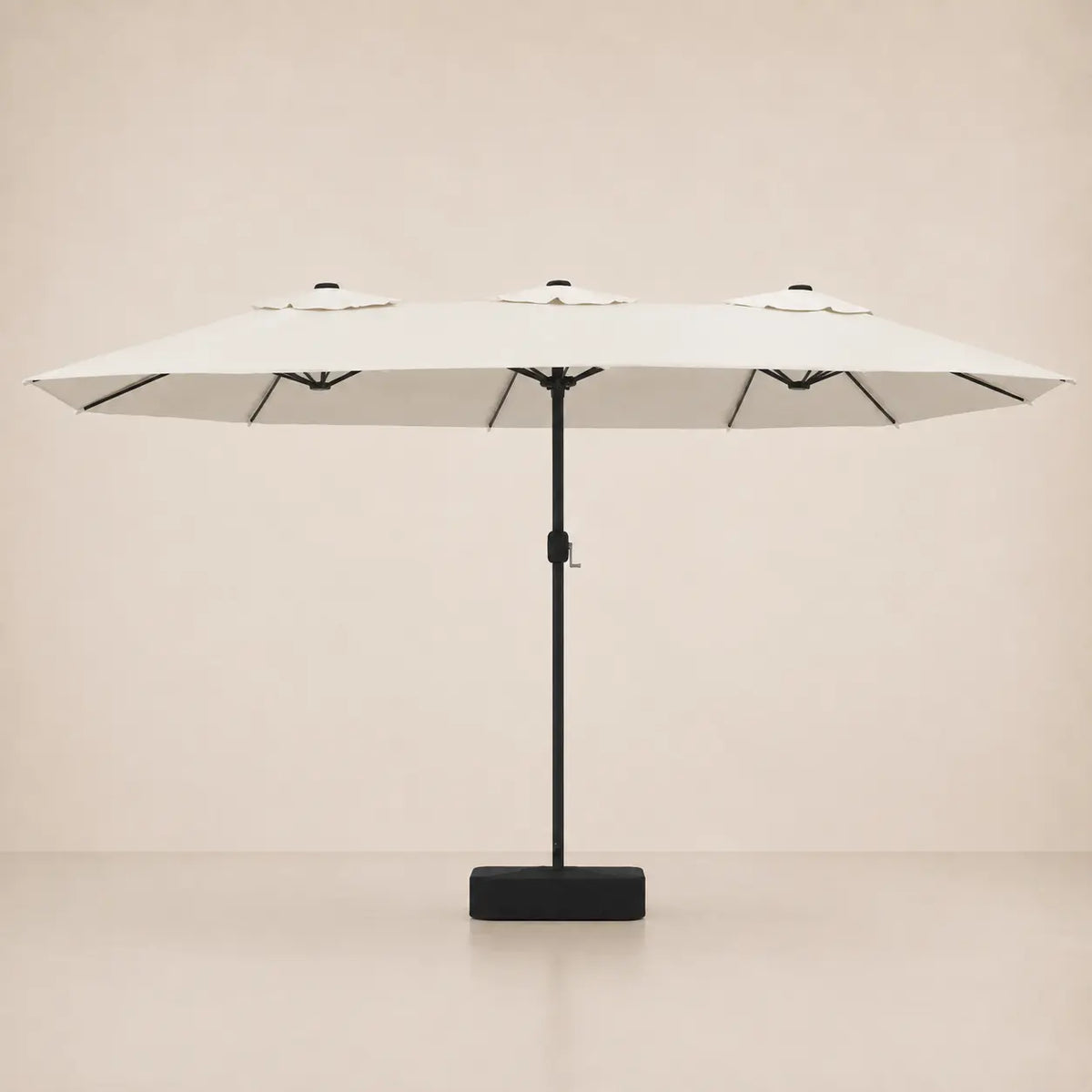 Sand white double canopy market umbrella with integrated LED lights, black aluminium pole and weighted square base
