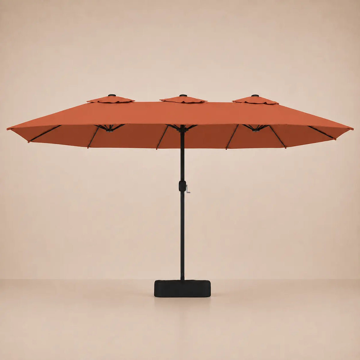 Terracotta double canopy market umbrella with integrated LED lights, black aluminium pole and weighted square base