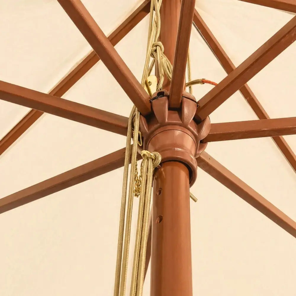 Close-up of the double pulley rope mechanism and hardwood hub on the Domaine 3.5m large market umbrella