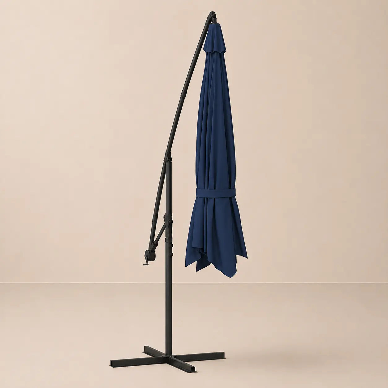 Round cantilever umbrella 3.5m Blue folded and secured with carry strap on cross stand – Marin