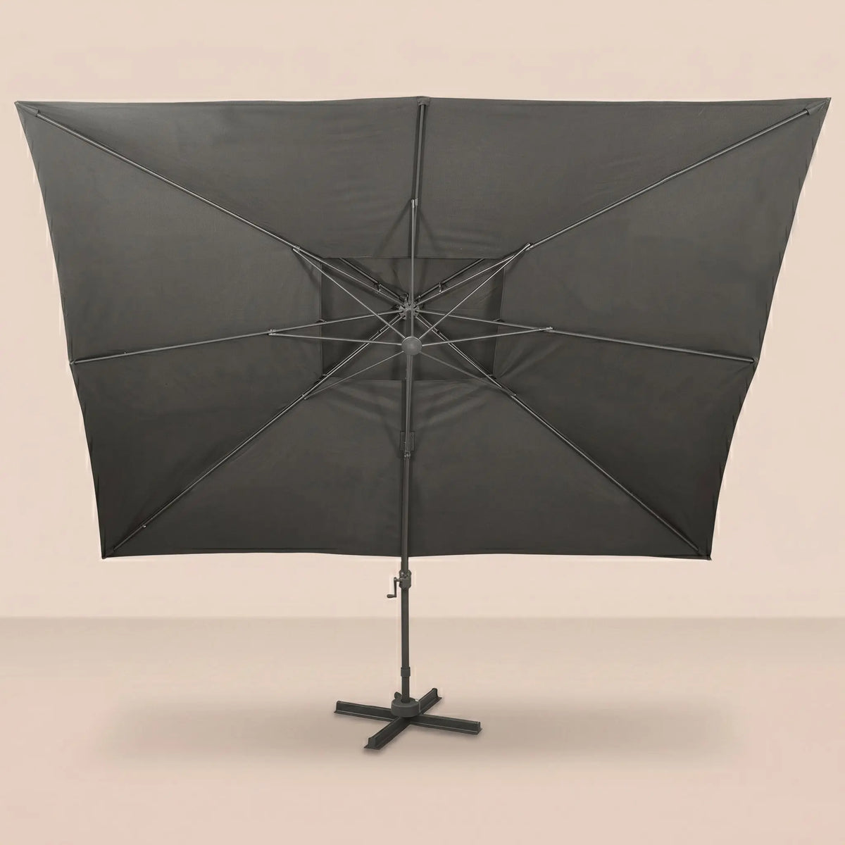 Rear view of the Levant XL 3x4m anthracite cantilever umbrella with eight-rib frame and vented double canopy