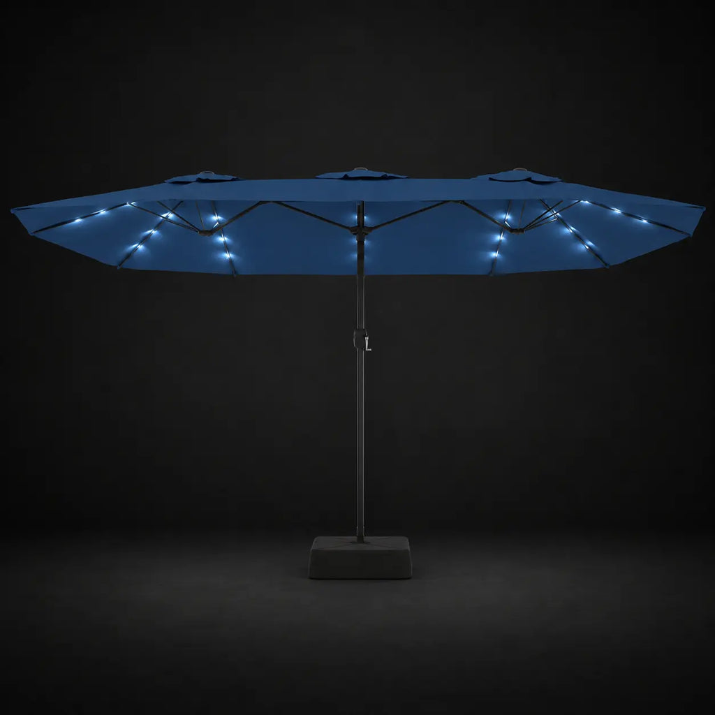 Azure blue double canopy market umbrella with integrated LED lights illuminated at night on a dark background