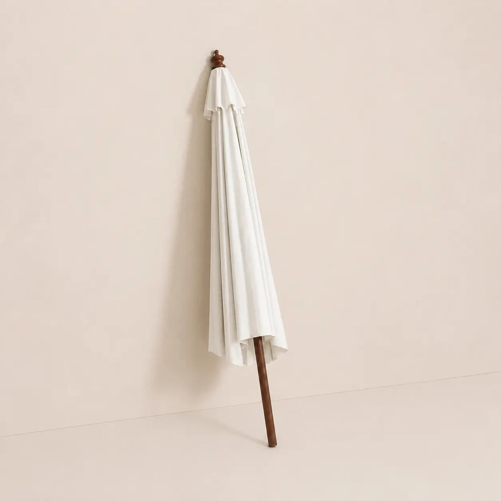 Domaine 3.5m large market umbrella folded closed with off-white canopy and turned hardwood finial for compact storage