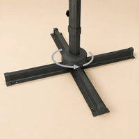 360-degree rotating cross base of the Tramontane XL cantilever umbrella for easy repositioning without moving the stand