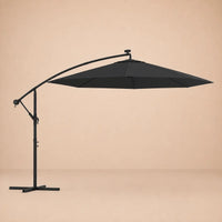 Round cantilever umbrella 3m Black fully open side view with solar panel and adjustable tilt arm – Maestro