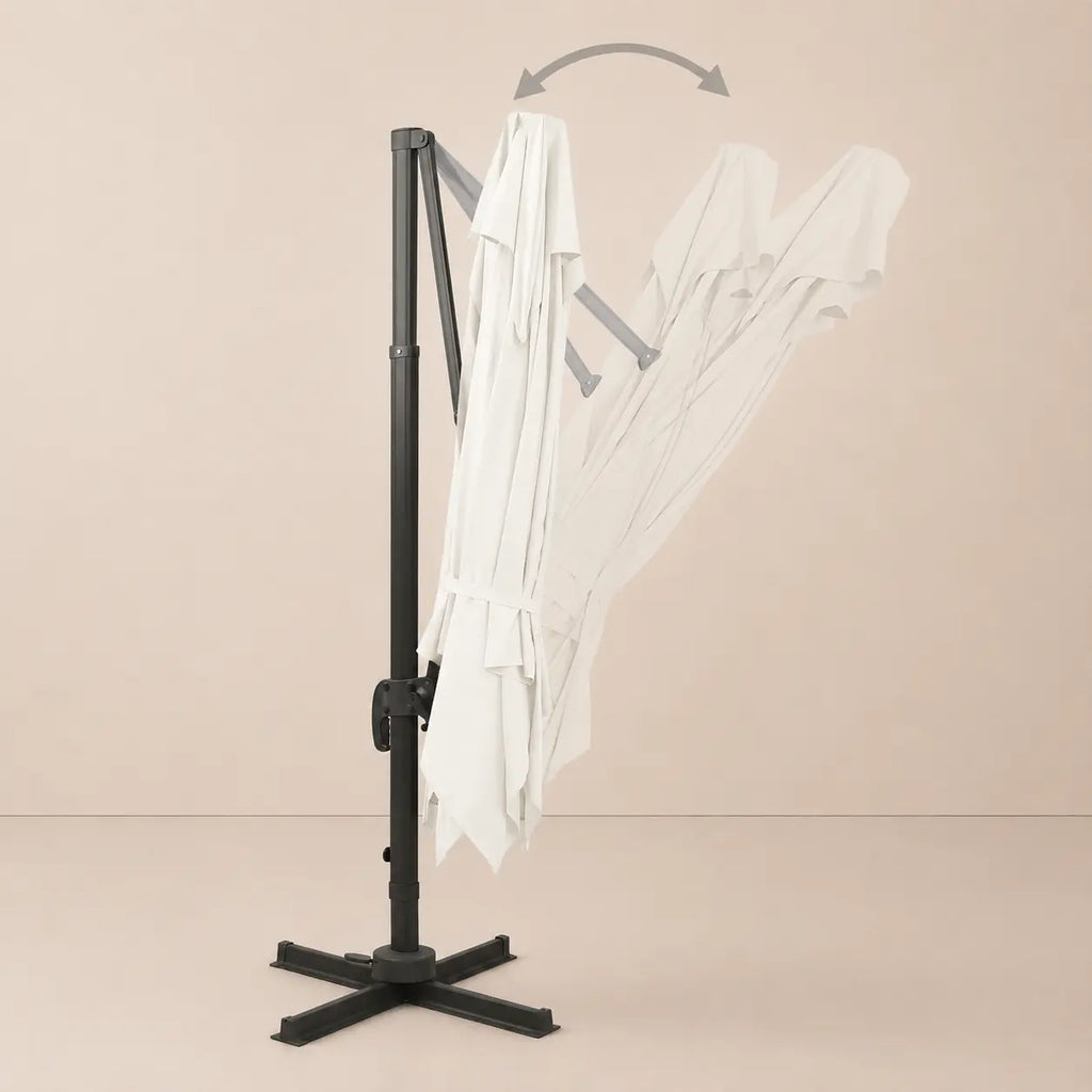 Tilt function of the 3x3m ivory cantilever umbrella allowing adjustable shade angles throughout the day