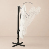 Tilt function of the 3x3m ivory cantilever umbrella allowing adjustable shade angles throughout the day