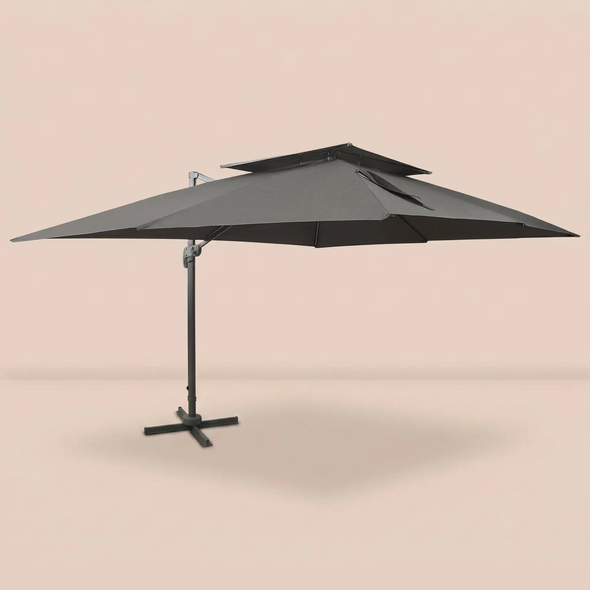 Side profile of the 3x4m anthracite cantilever umbrella with double wind-vented canopy and offset aluminium pole