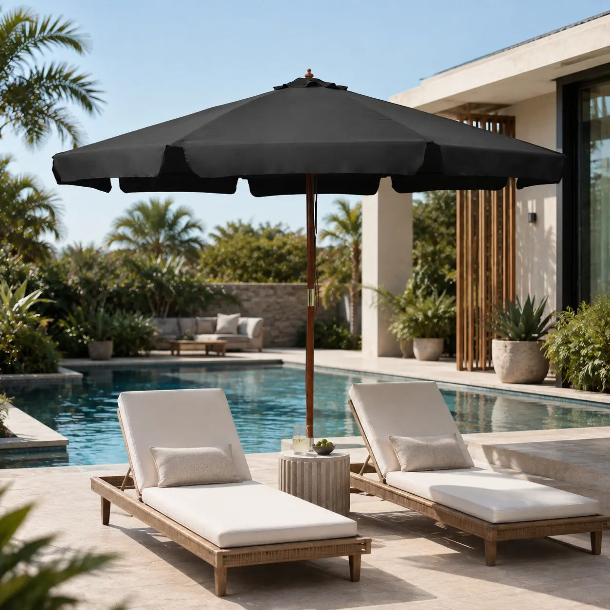 Anthracite market umbrella providing shade over timber sun loungers beside an outdoor pool