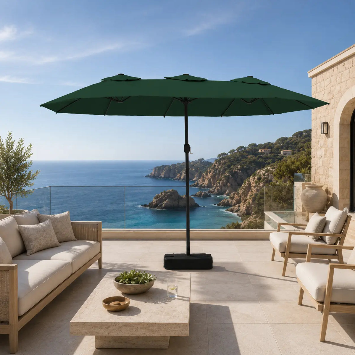 Large green double canopy market umbrella over timber outdoor lounge furniture on a coastal Australian terrace