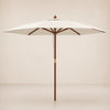 Full product view of the Mas 3m round market umbrella with sand canopy, carved hardwood finial and brass fitting