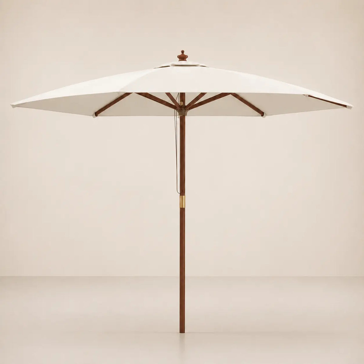 Full product view of the Mas 3m round market umbrella with sand canopy, carved hardwood finial and brass fitting