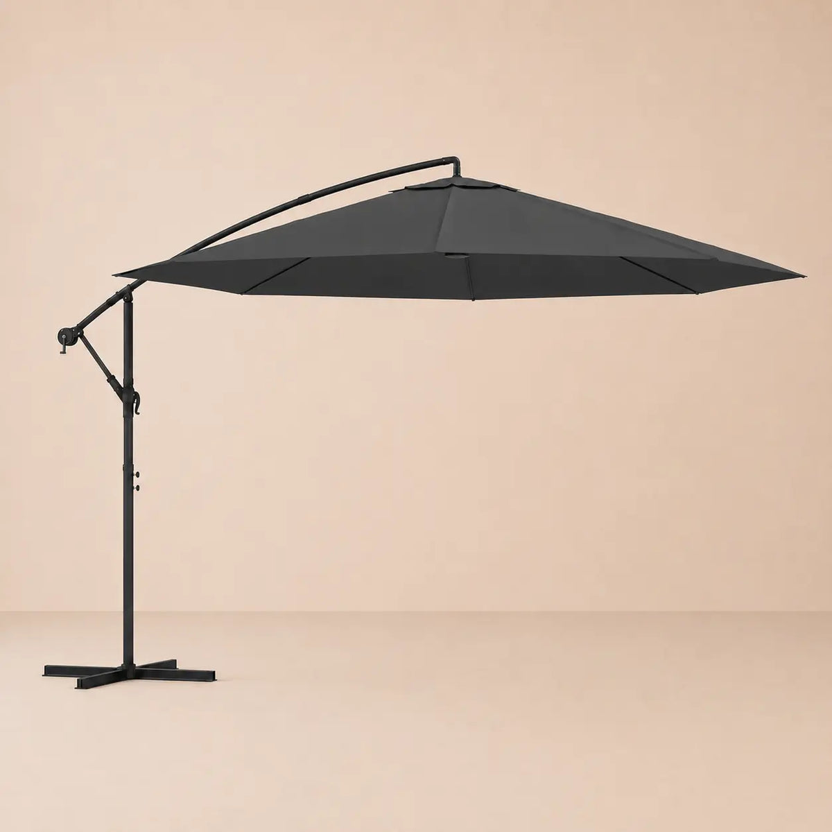 Round cantilever umbrella 3.5m Black fully open side view with vented canopy and crank arm – Ostro