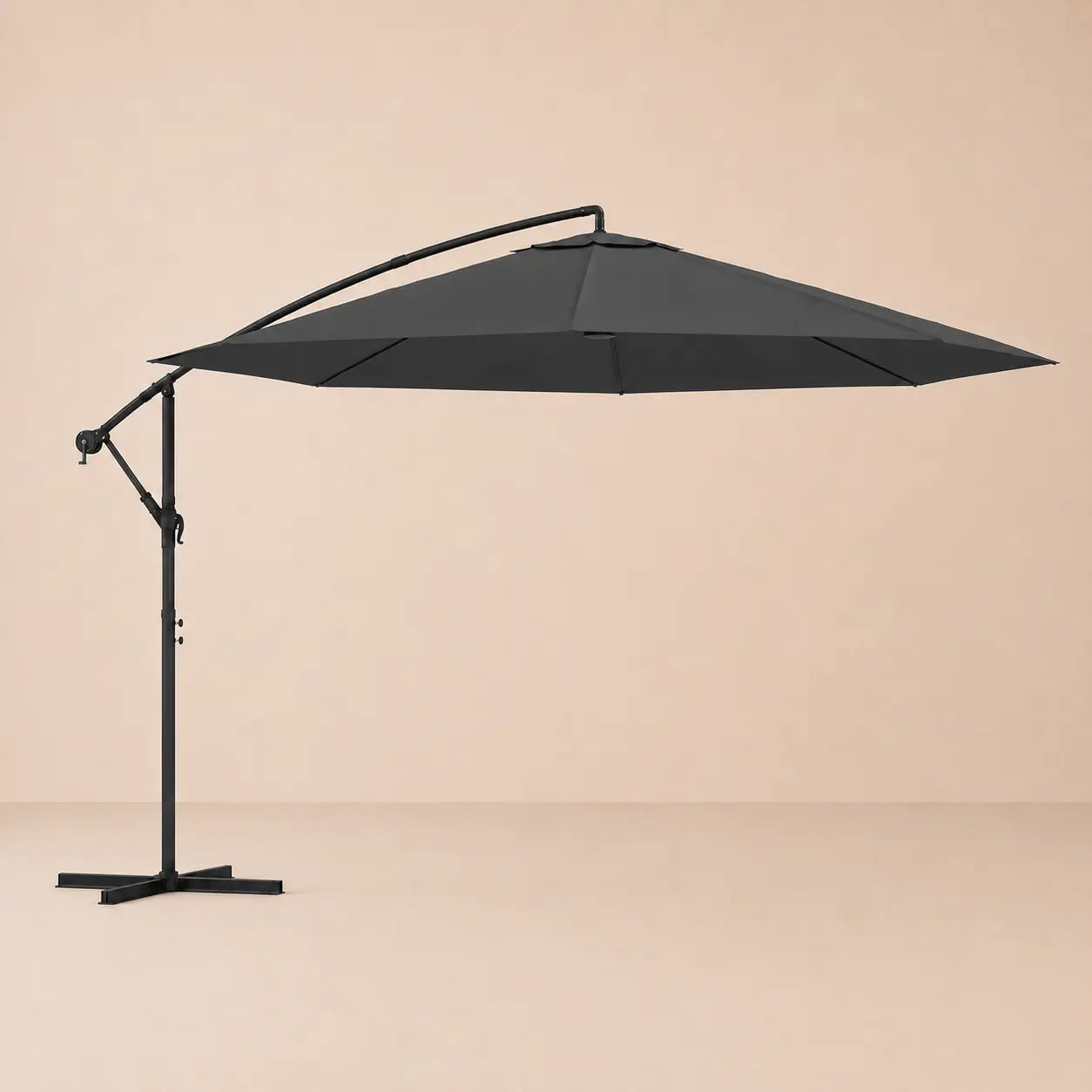 Round cantilever umbrella 3.5m Black fully open side view with vented canopy and crank arm – Ostro
