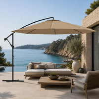 Round cantilever umbrella 3.5m Taupe over outdoor sofa on coastal villa patio – Bora