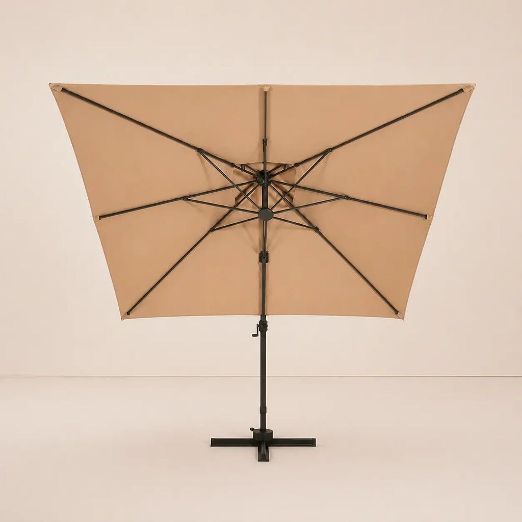 Rear view of the Tramontane square cantilever umbrella with reinforced ribs and vented double canopy in taupe