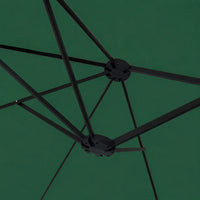 Underside view of a green double canopy market umbrella showing black metal rib frame and dual hub junction