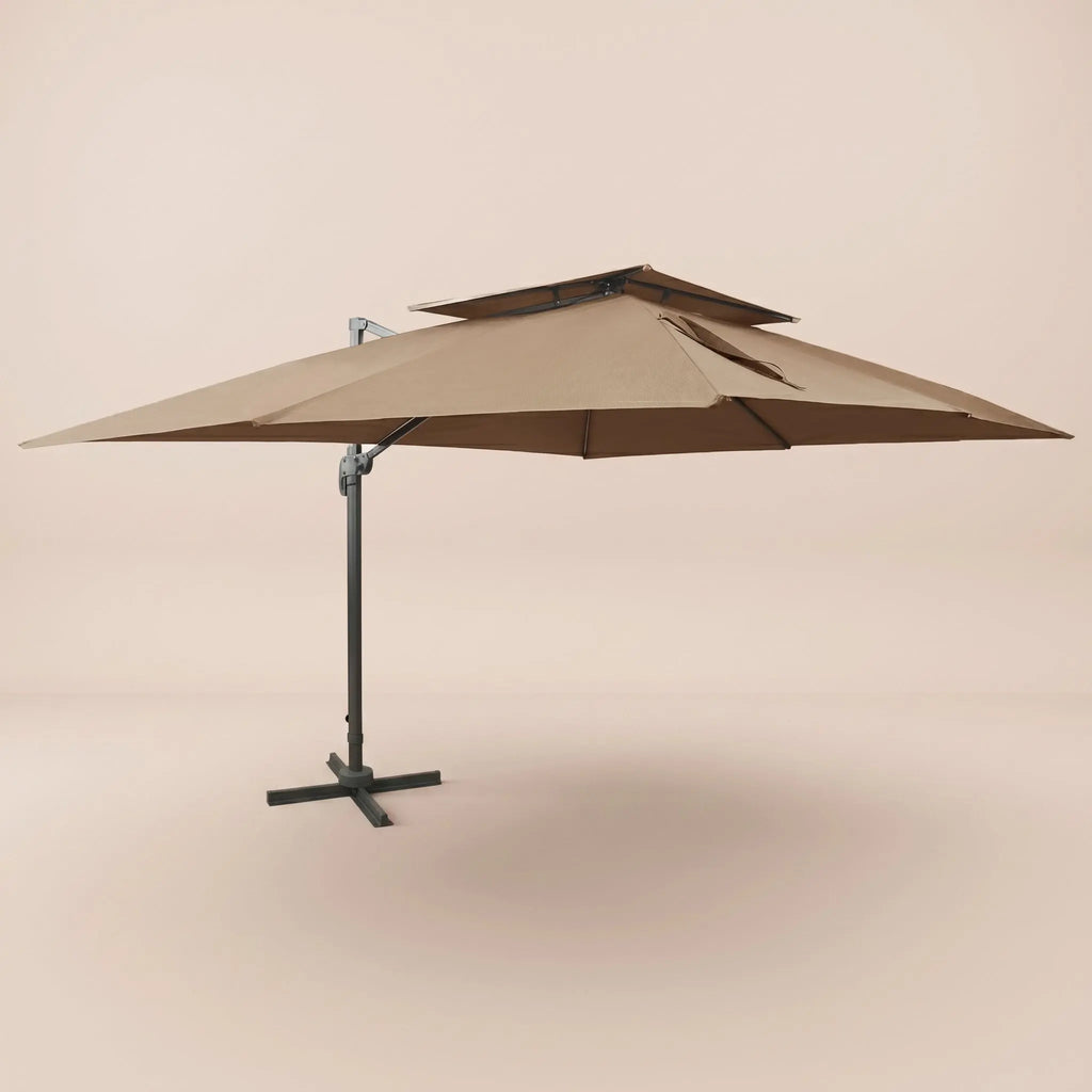 Side profile of the 3x4m taupe cantilever umbrella with double wind-vented canopy and offset aluminium pole