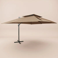 Side profile of the 3x4m taupe cantilever umbrella with double wind-vented canopy and offset aluminium pole