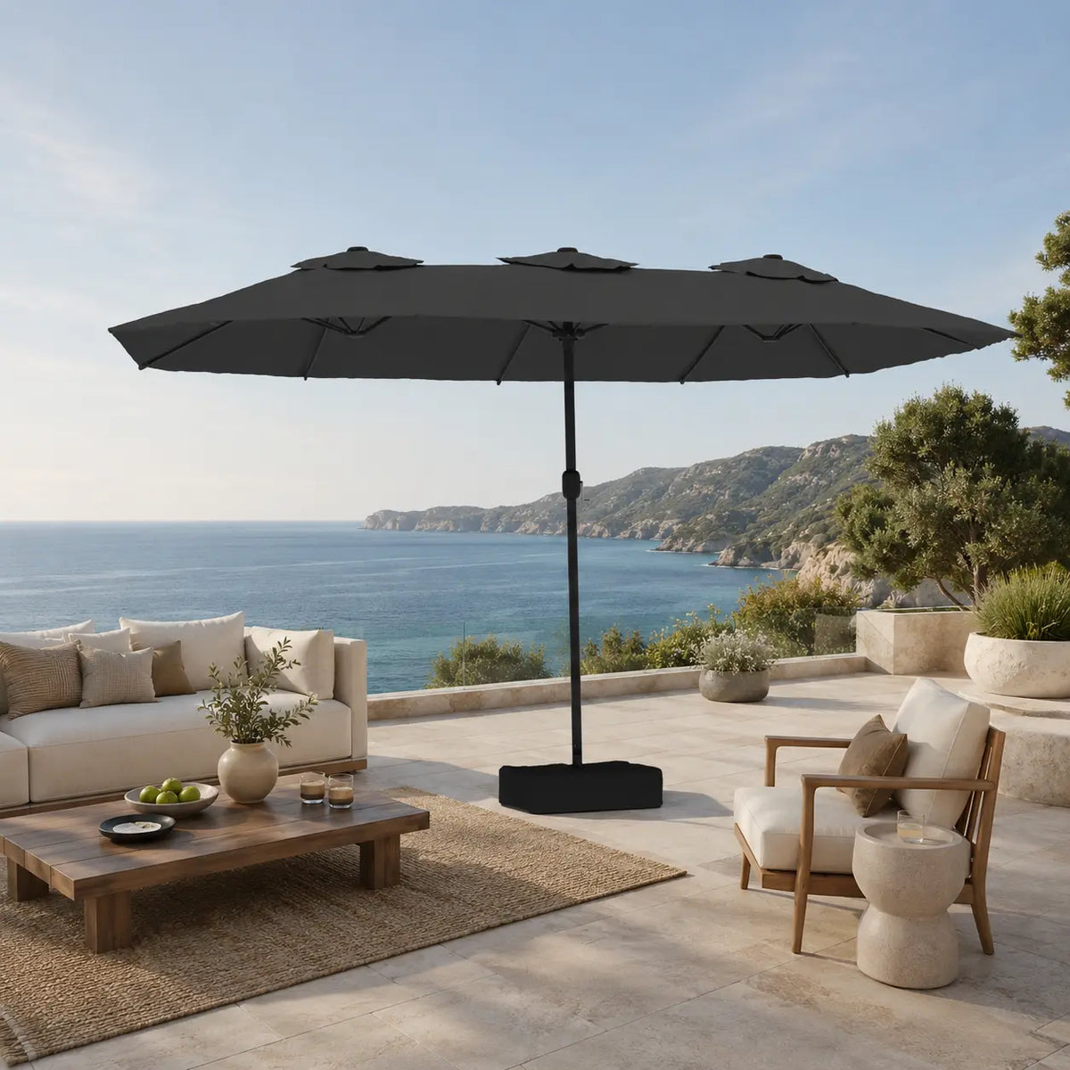 Large anthracite double canopy market umbrella over timber outdoor lounge furniture on a coastal Australian terrace