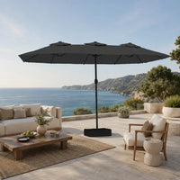 Large anthracite double canopy market umbrella over timber outdoor lounge furniture on a coastal Australian terrace