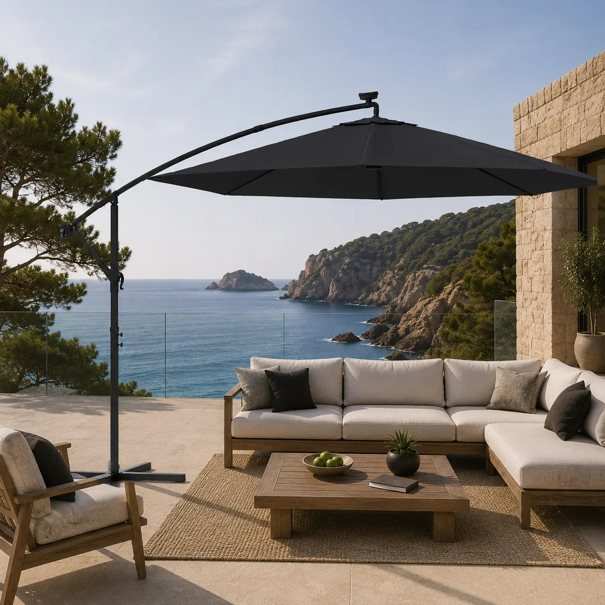 Round cantilever umbrella 3m Black shading outdoor teak sectional sofa on coastal terrace with glass railing – Maestro