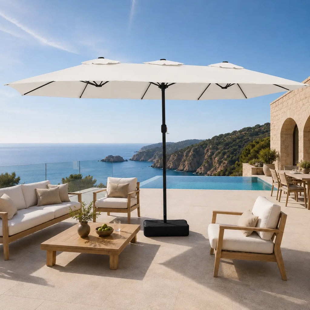 Large sand white double canopy market umbrella over timber outdoor lounge furniture on a coastal Australian terrace
