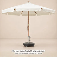 Clos sand white market umbrella standing in the Roche 30 kg granite umbrella base