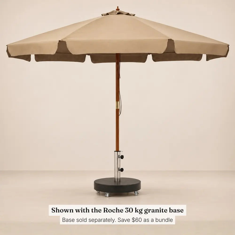 Garrigue taupe market umbrella standing in the Roche 30 kg granite umbrella base
